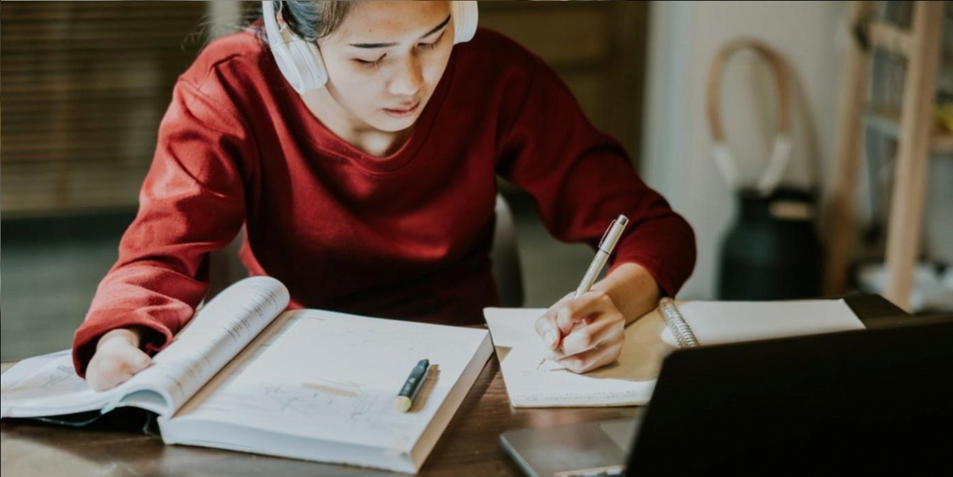 Specialist reviewing a client work plan in detail